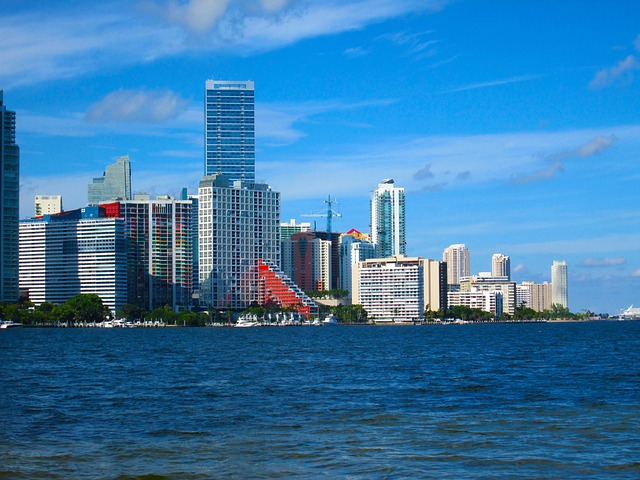 A waterfront skyline of high-rise buildings along the water's edge in South Florida, the coastal properties Waterfront Property Insurance Florida is built for.