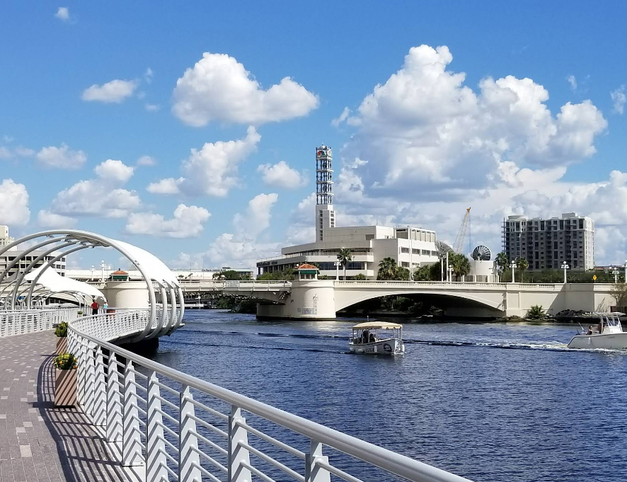 Downtown Tampa's Riverwalk and skyline along the water, the flood-prone area 3A Allied Insurance covers with Hillsborough County Insurance.