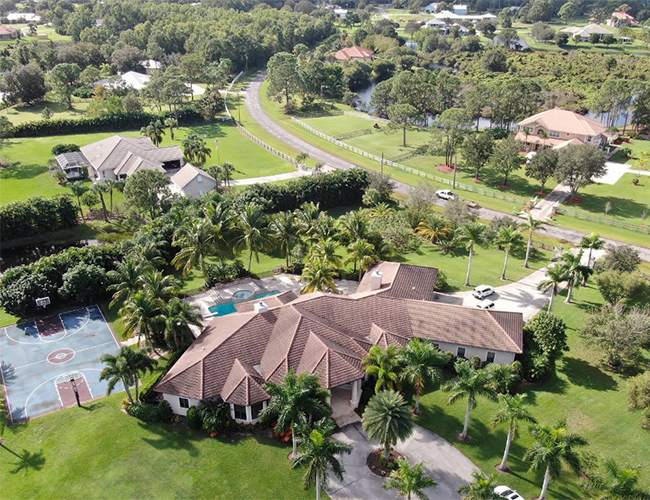A waterfront home with a pool near a canal in Martin County, the coastal property 3A Allied Insurance protects with Martin County Insurance.