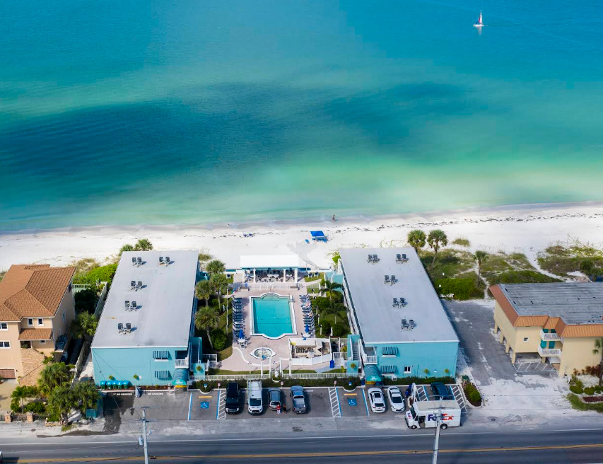 Beachfront condos and a pool along the Gulf Coast near Bradenton, the coastal property 3A Allied Insurance protects with Manatee County Insurance.
