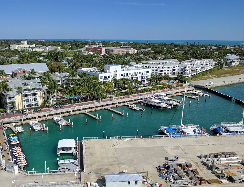 A Monroe County marina with docked boats and waterfront buildings, the island exposure 3A Allied Insurance covers with Monroe County Insurance.