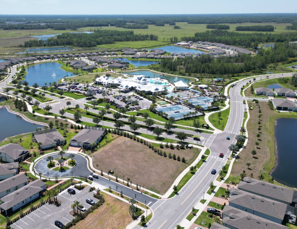 A growing Pasco County suburban neighborhood with houses and ponds, the community growth 3A Allied Insurance covers with Pasco County FL Insurance.
