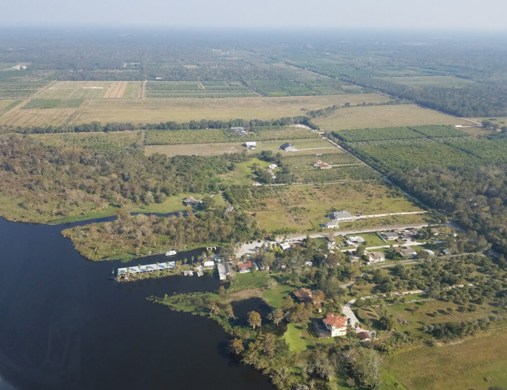 A rural Seminole County waterfront with a river and farmland, the mix of properties 3A Allied Insurance covers with Seminole County Insurance.